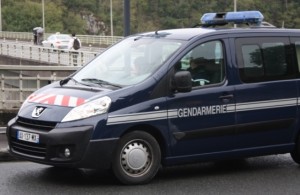 This picture does not tell the true story... we were actually illegally parked on a road to get a photo and the gendarmerie (police) called Mal over (he is actually talking to them in the picture but is hidden by the car). I thought we were about to get another fine (yes, another!!), but they only needed help with finding an emergency car that was supposed to have just passed us????
