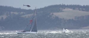 A bit hazy.... Wild Oats with media helicopter coming up the Derwent River near home