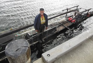 Tom, our excentric, but wonderful neighbour at the launch of his 18 meter home made boat just before we left for our trip. Crazy !!!
